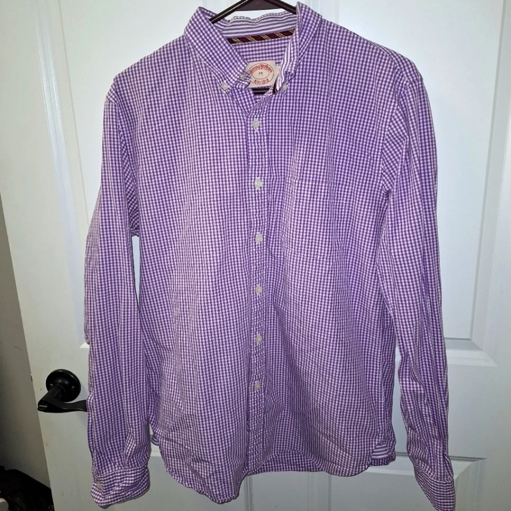 A Brooks Brothers purple plaid long sleeve button-down shirt in a men's medium. - Picture 1 of 7